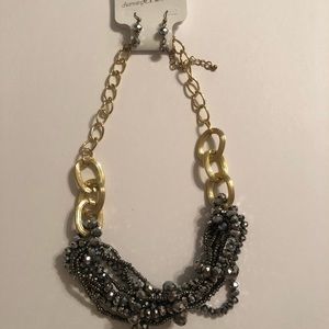 NEW!! Gorgeous dress necklace and earrings Charming Charlie